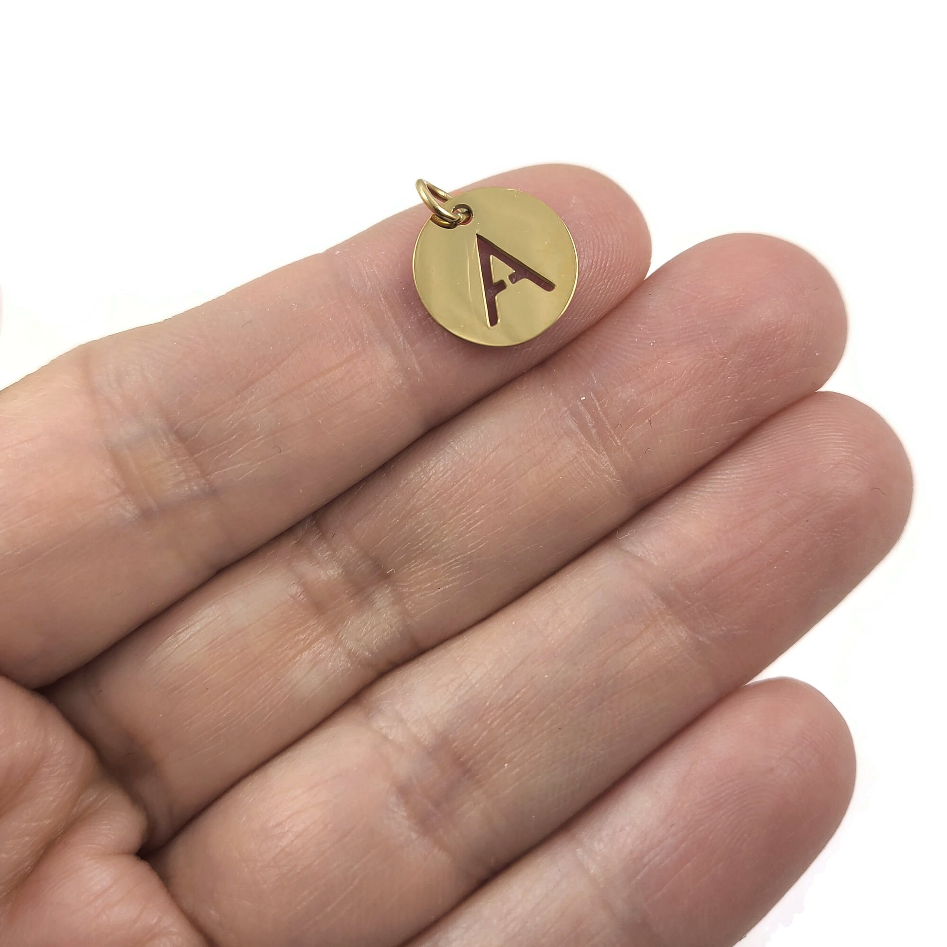 1 Gold stainless steel coin letter charm