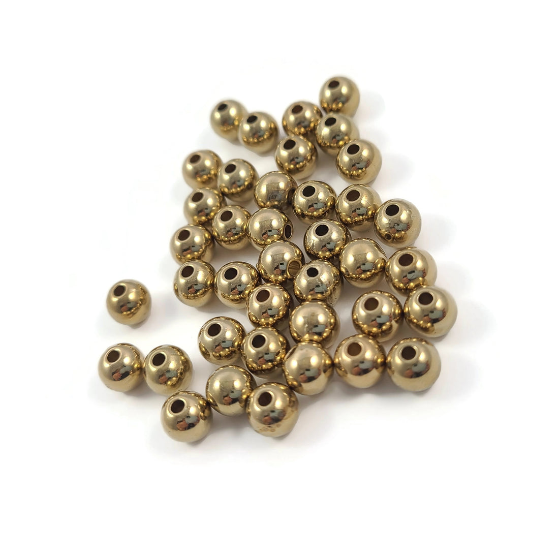 Perles en plastique doré de 6mm