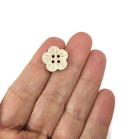 6 Flower shape white coconut buttons