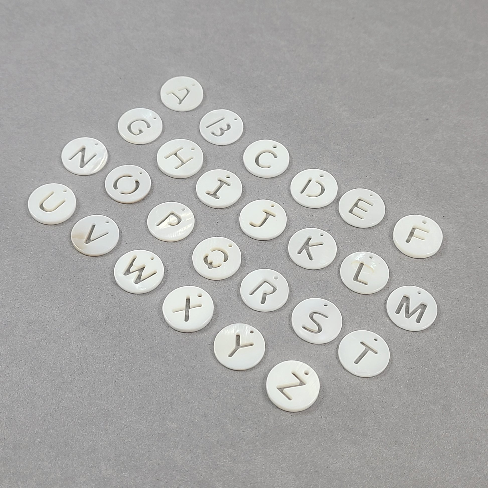1 Natural freshwater shell coin letter charm
