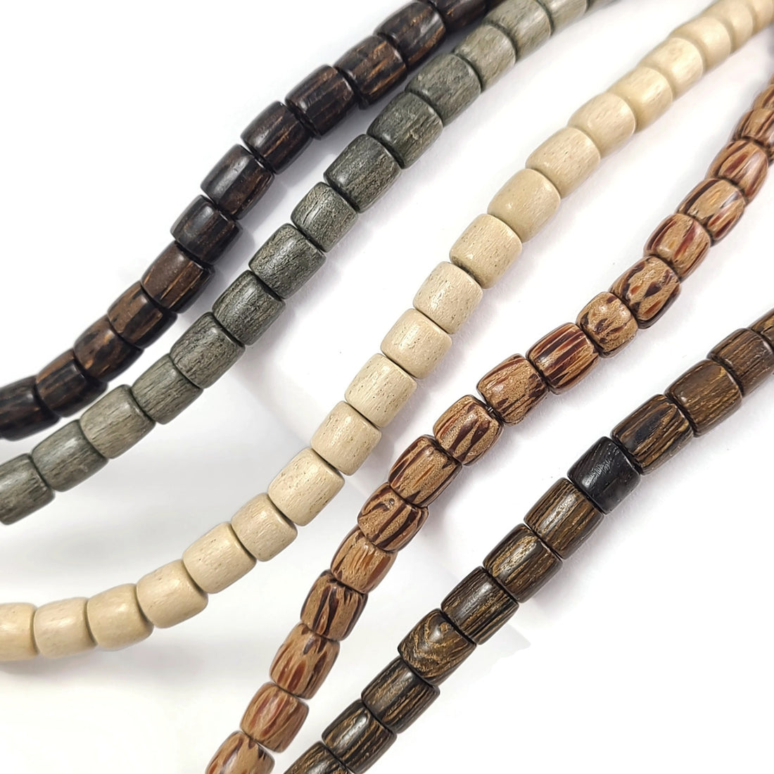 Perles tube en bois exotique de 6mm