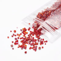 Red glass seed bead grab bag, Mixed shapes