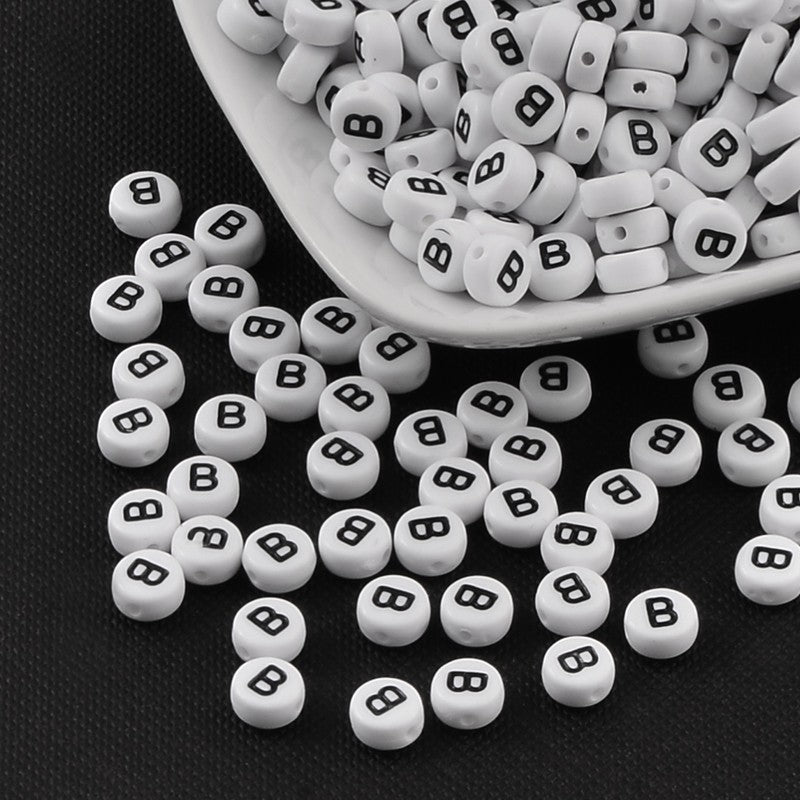 1 Black and white flat round letter bead