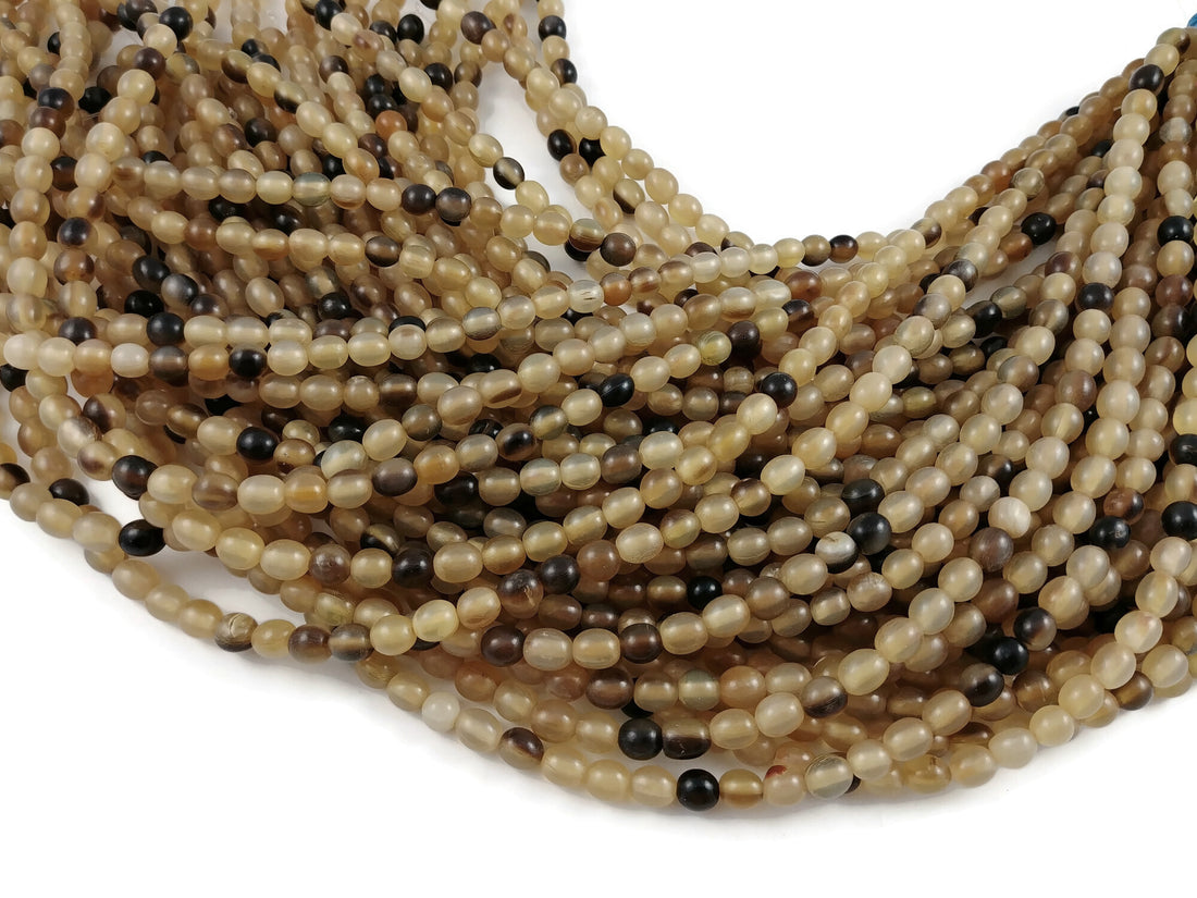 55 Perles en corne naturelle 6-7mm
