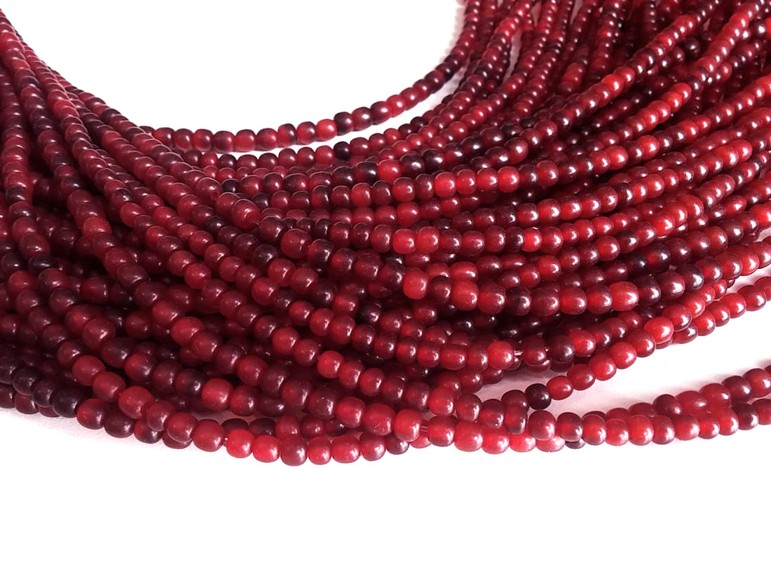 Perles rouges en corne naturelle 4-5mm