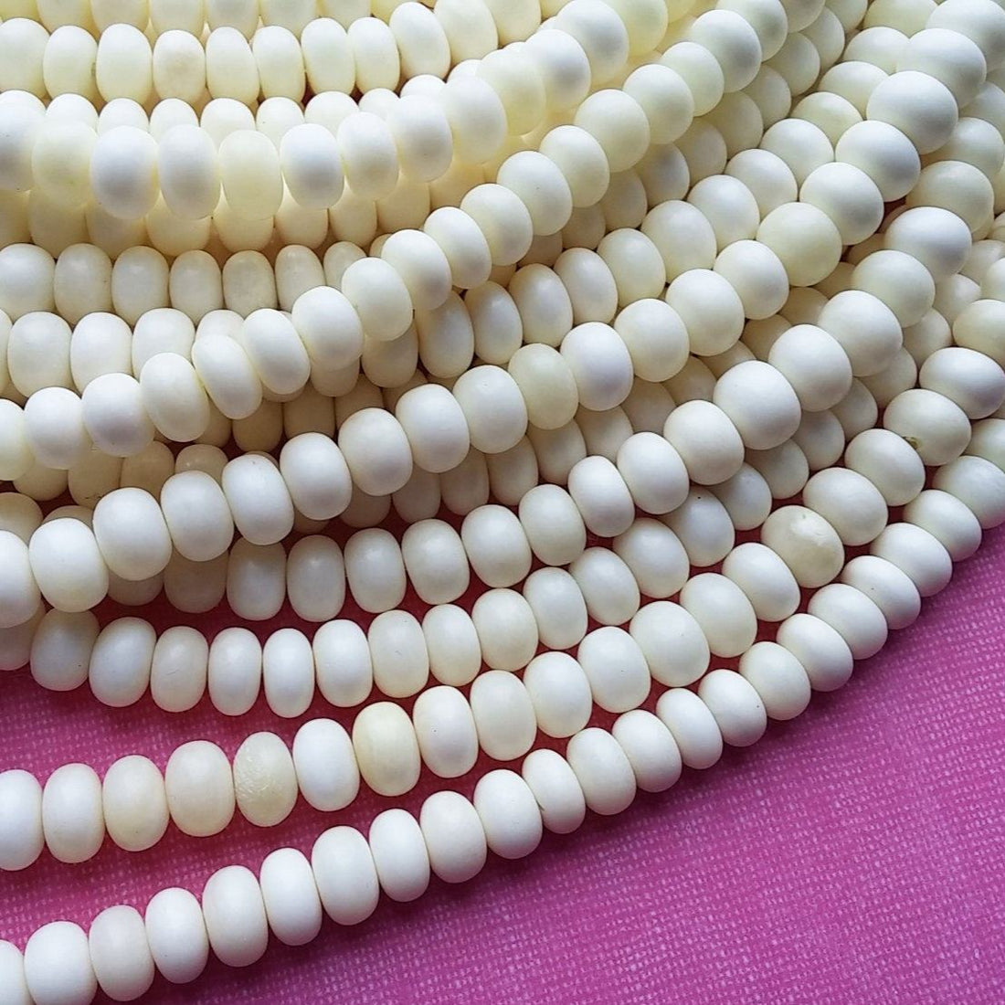 15 Perles rondelles en os naturel blanc 10mm