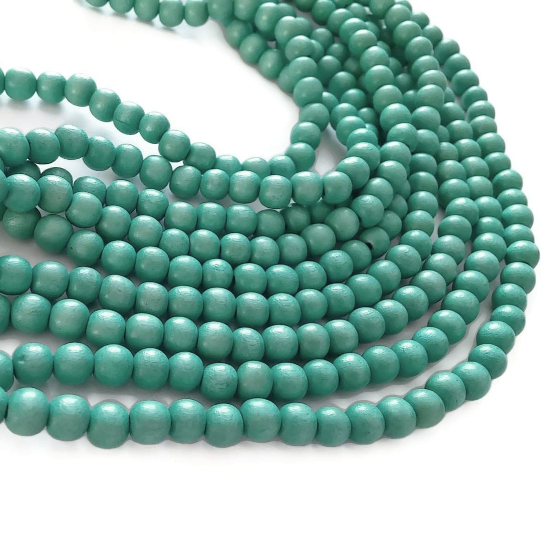 Perles de bois rondes turquoises 6mm, 8mm ou 10mm