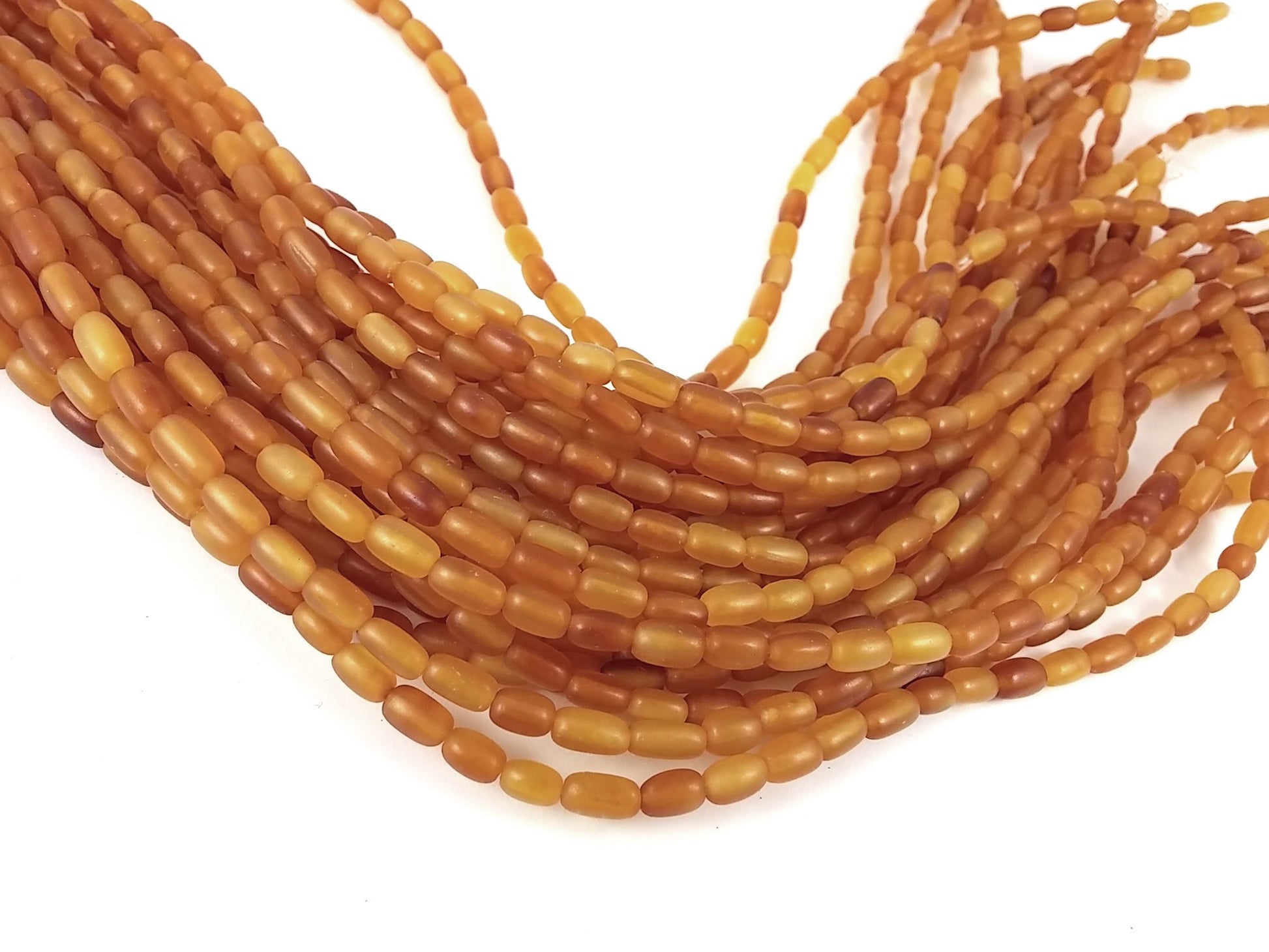 60 Natural horn rice beads 7x4mm