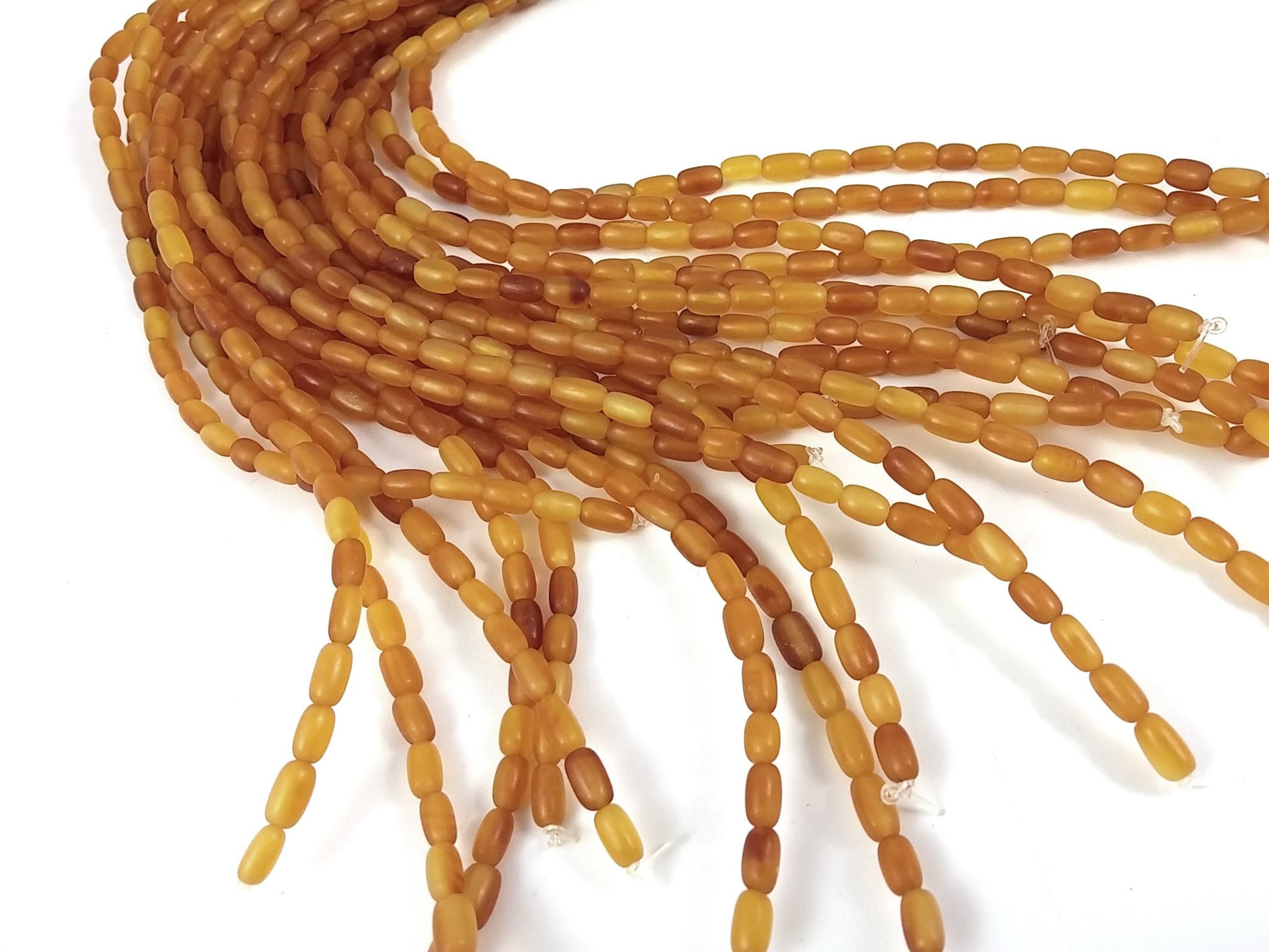 60 Natural horn rice beads 7x4mm