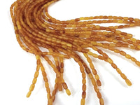 60 Natural horn rice beads 7x4mm