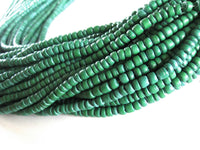 Green coconut rondelle beads 5mm
