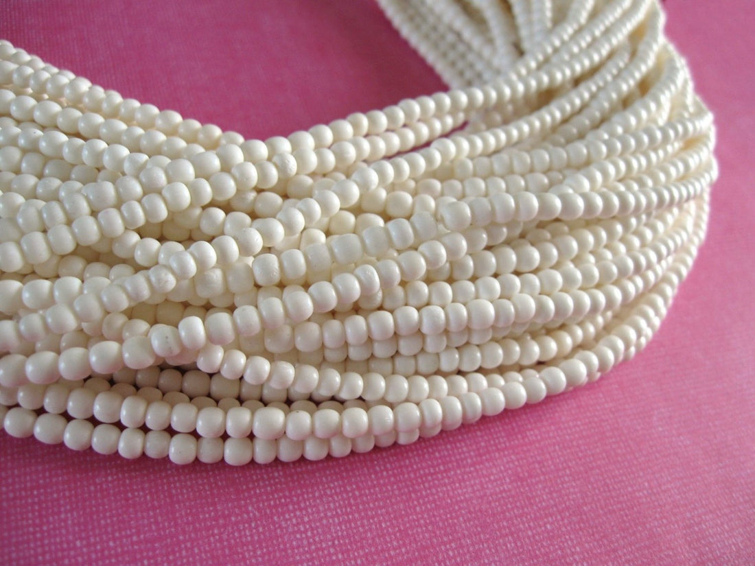 100 Perles rondes en os naturel blanc 3-4mm